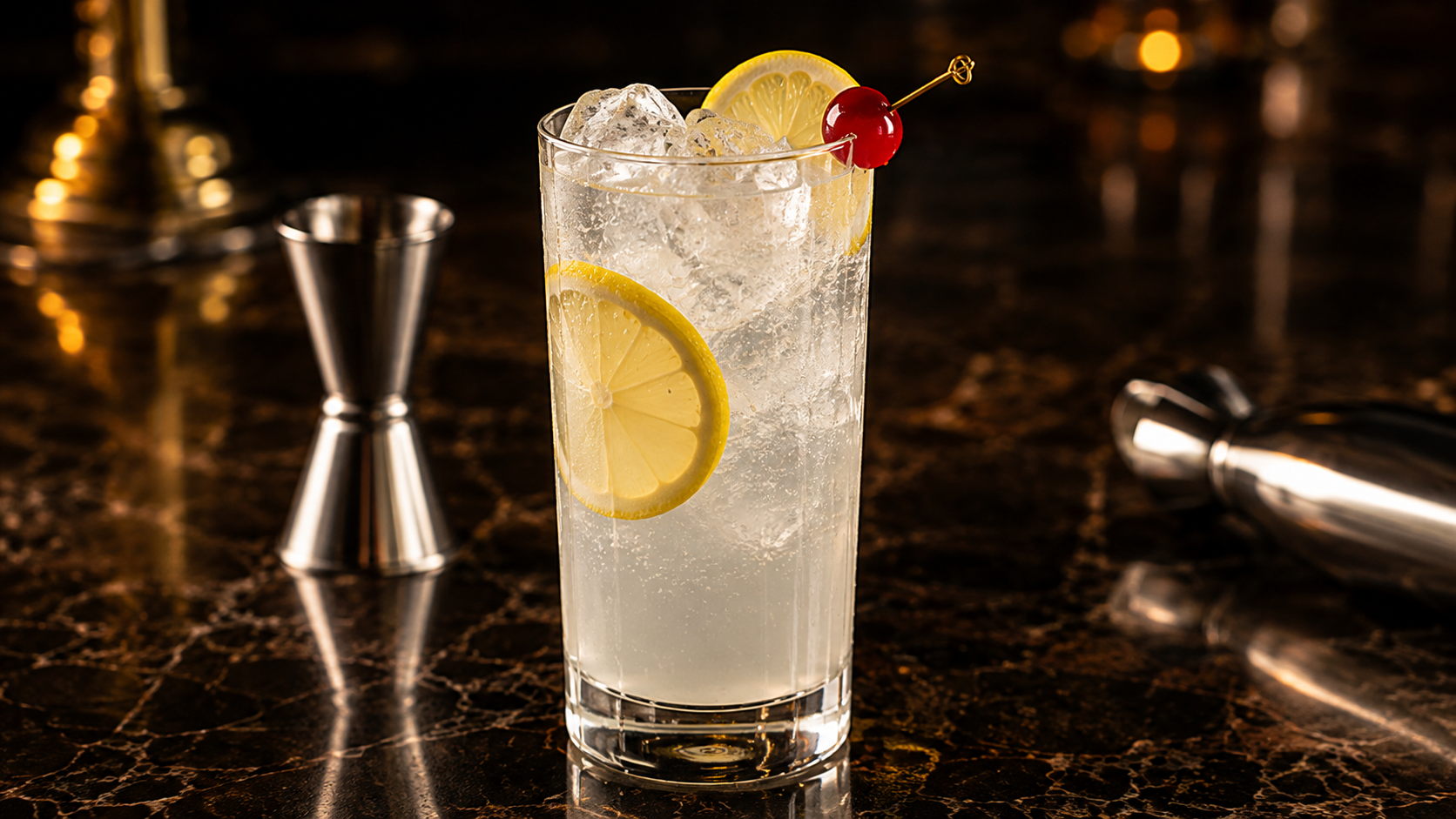 TOM COLLINS
